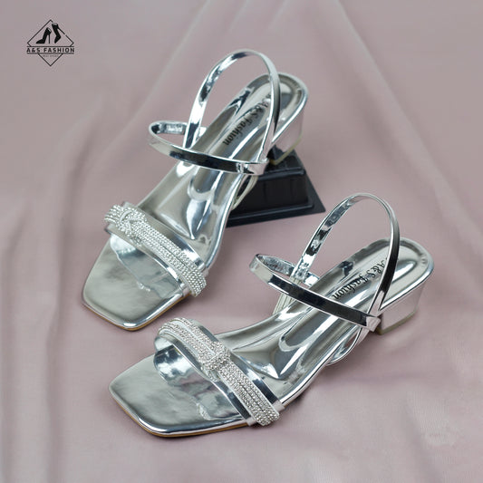 Metallic gold color and have a low heel Shoes