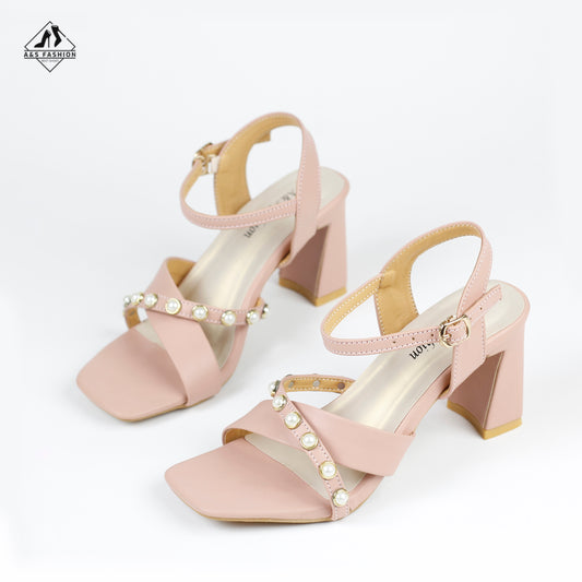 There are small pearl embellishments on the straps.